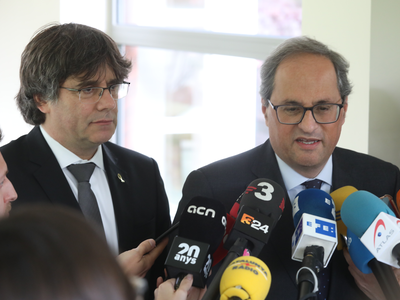 Els presidents Torra i Puigdemont, durant la compareixença informativa
